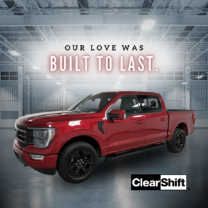 Red Ford F-150 pickup truck with the Valentine’s message “Our Love Was Built to Last.”