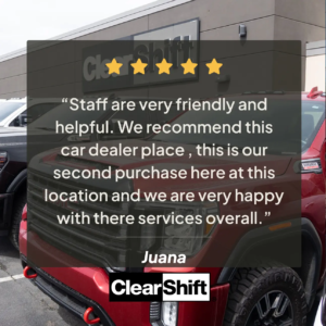 Customer review banner with trucks in the background: 'Staff are very friendly and helpful. We recommend this car dealership, this is our second purchase here at this location, and we are very happy with their services overall.' - Juana